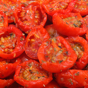 Semi-dried cherry tomato halves  – marinated
